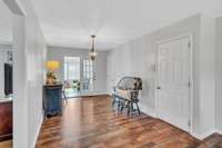 This side of the kitchen is where you would want to put your table/chairs & there's room for a hutch. First door leads to the basement, second door on the right leads to back stairs to the 2nd floor.  Lastly, french doors take you to the sunroom.