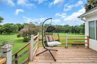 The back deck was newly replaced.  It is accessible from the sunroom, living room or there are stairs leading to the back yard.