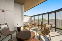 The second shared terrace offers a perfect spot for friends to gather and enjoy a glass of wine together.