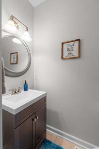 Guest bath with vanity storage.