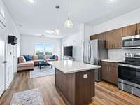 Large kitchen which opens to living room