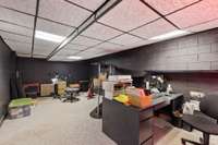 Another extra room in the basement: More storage, Office, workout room, potential safe room or more