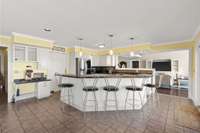 Super sized kitchen with everything you could need, over looking the lake, eat-in and see the storage / utility room for kitchen.