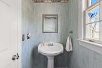 1/2 Bath just off kitchen