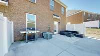 Enough space for large seating area, hot tub, and grill. Ideal for entertaining.