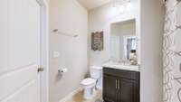 Guest bathroom with entry from guest suite.