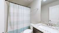 Full bath for the additional two bedrooms upstairs.
