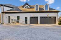 upper garage with plenty of parking and 3 pads to the right