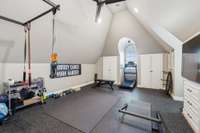 4th bedroom being used as workout room. Hardwood floors beneath.
