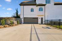 lower garage for up to three more vehicles with full bathroom and massive amounts or storage