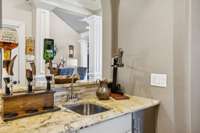 bar and staging between kitchen and dining room