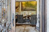 Inviting entrance foyer with soaring ceilings