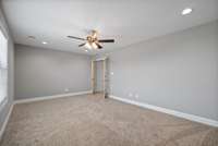 The bonus room features french doors, creating a private space!