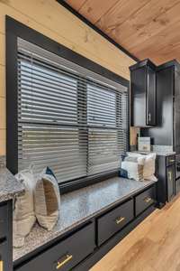 NEW KITCHEN LAYOUT!  Interior of similar cabin in community.  Interior finishes will vary from cabin to cabin.