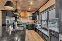 NEW KITCHEN LAYOUT!  Interior of similar cabin in community.  Interior finishes will vary from cabin to cabin.
