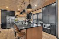 NEW KITCHEN LAYOUT!  Interior of similar cabin in community.  Interior finishes will vary from cabin to cabin.