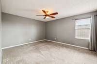 Second bedroom upstairs.  Large closet and remote controlled ceiling fan/light.