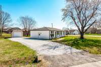 Lots of off-street parking and a detached garage/building.
