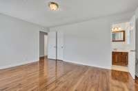 Another view of master bedroom- offers full bath and Walkin closet