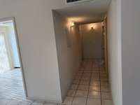Hallway to Bedrooms and Bath and Separate Utility Room