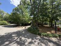 901 Holly Forest is located across the Street from the Clubhouse, Swimming Pool, Tennis Courts and Mailboxes