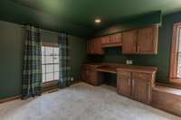 Built in desk in large bonus room over garage