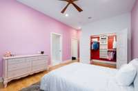 A similarly spacious 12ft x 18ft bedroom connects to the same modern bathroom.