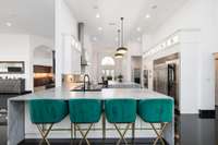 Extra cabinet storage hidden behind the bar stools ensures you'll truly have a place for everything in this one-of-a-kind kitchen.