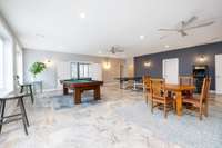 The current owners upgraded the downstairs level with fresh paint on the walls and a complete replacement of outdated ceiling tiles. The new modern drywall ceiling now matches the refined style of the rest of the home.
