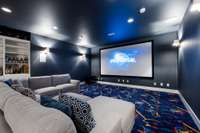 Take movie nights to the next level with this home theater, featuring negotiable top-of-the-line equipment, including a Sony 4K HDR projector, an acoustic screen, and a Dolby Atmos 11.2 surround sound system.