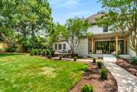 The outdoor space is absolutely sunning. There is plenty of room for a pool, and the fresh landscaping is the icing on top.