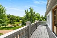 This is the view of the grounds, overlooking the pond with treetop views from the second floor balcony. Just stunning and one of a kind.
