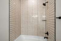 The tile work in all secondary bathrooms is impeccable, and you will notice a high level of detail throughout the home.