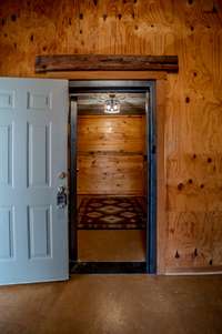 Vault Entrance Through Workshop