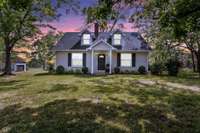 OPPORTUNITY...Guests, Rental Income or Home Office. 1700sf to do whatever you wish in addition to the main house!