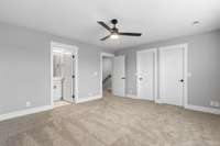 This bedroom includes two separate closets!