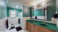 Large bathroom with storage & ceramic tile.