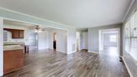 New Vinyl Plank Flooring: Formal Living, Dining, Kitchen, & Hallway. New Paint