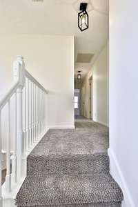 Front stairway upstairs landing.
