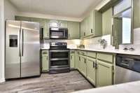 Microwave range hood, double oven, dishwasher, garbage disposal.