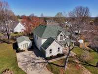 Better view of the driveway, which offers space for guests to park and still allow for garage parking access.
