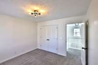 Bedroom three is at the top of the front stairs landing.