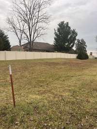 View from the far Left property line on the other side of the fenced area.