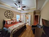View of the Primary Bedroom Suite towards the bath.
