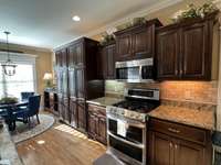 Custom Cabinets galore with granite counter tops.
