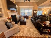 Spacious Living Room. Check out all the mill work in this fabulous home!