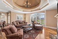 Often known as the "keeping room" this extra living space directly off the kitchen let you never miss a beat while preparing dinner. Look at this octagonal domed ceiling and chandelier.