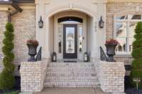 The grand front entry invites you to experience the unique design and features of this home.