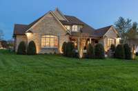 The backyard receives the same love an attention as the front with well manicured landscaping.