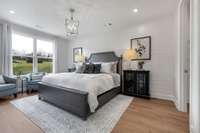 Stock Model Photo. Downstairs Guest Suite w/ full bathroom and walk in closet! Perfect for guests or in-law suite!